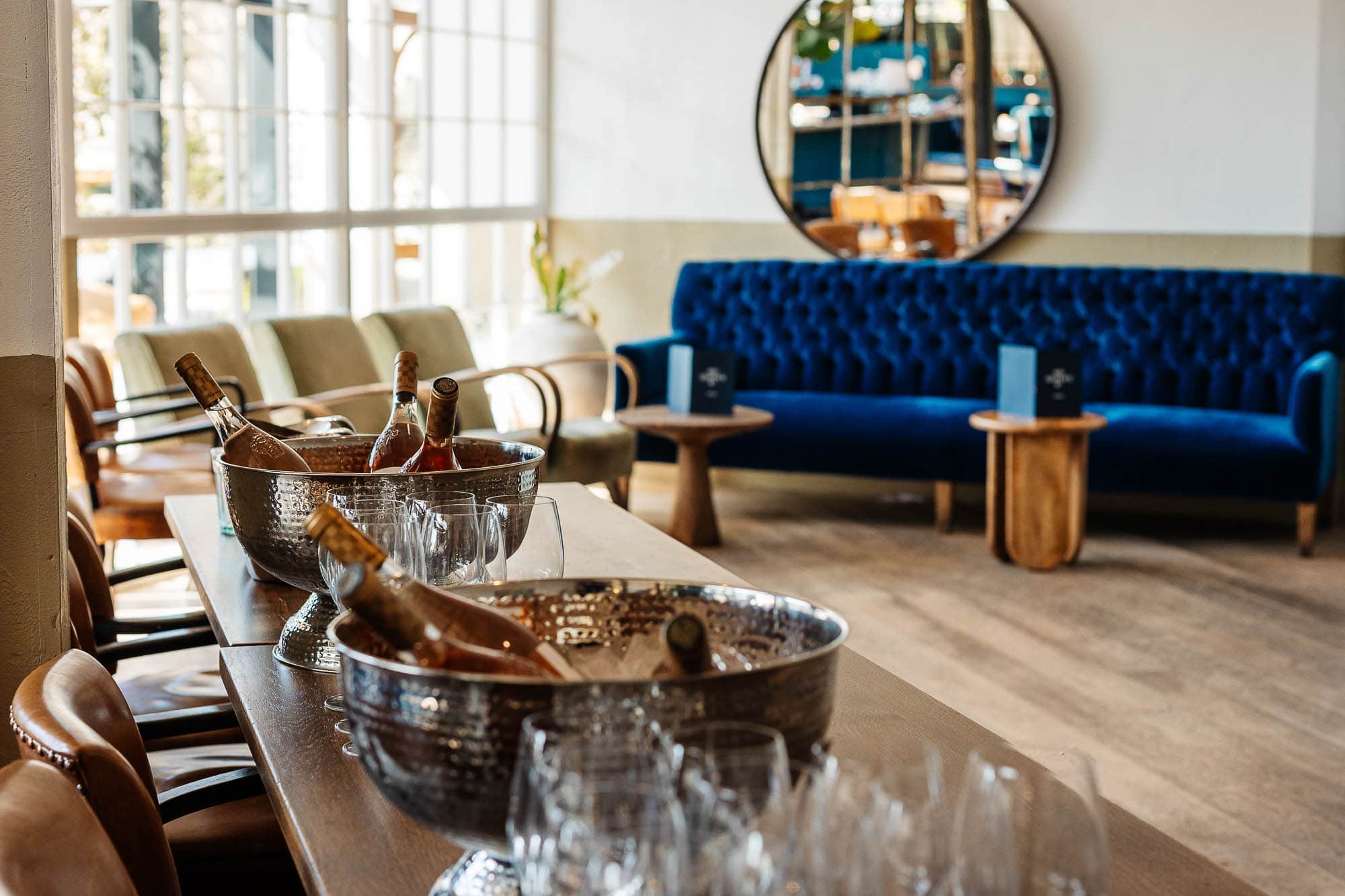 Elegant interior of a Rutland restaurant showcasing a stylish dining area with natural light, comfortable seating, and a focus on food presentation for marketing and culinary photography.